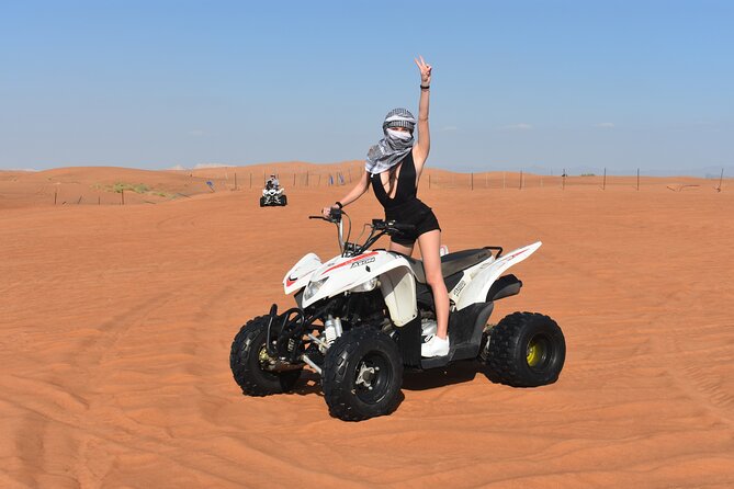 Sunset Desert Safari Quad bike Camel ride Sand Board & BBQ Dinner - Pickup in Dubai or Sharjah: your time stays yours