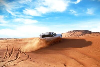 Thrilling 4-Hour Dune Bashing & Camel Ride Safari to Inland Sea - Getting Picked Up in Doha: The 4x4 Comfort Factor