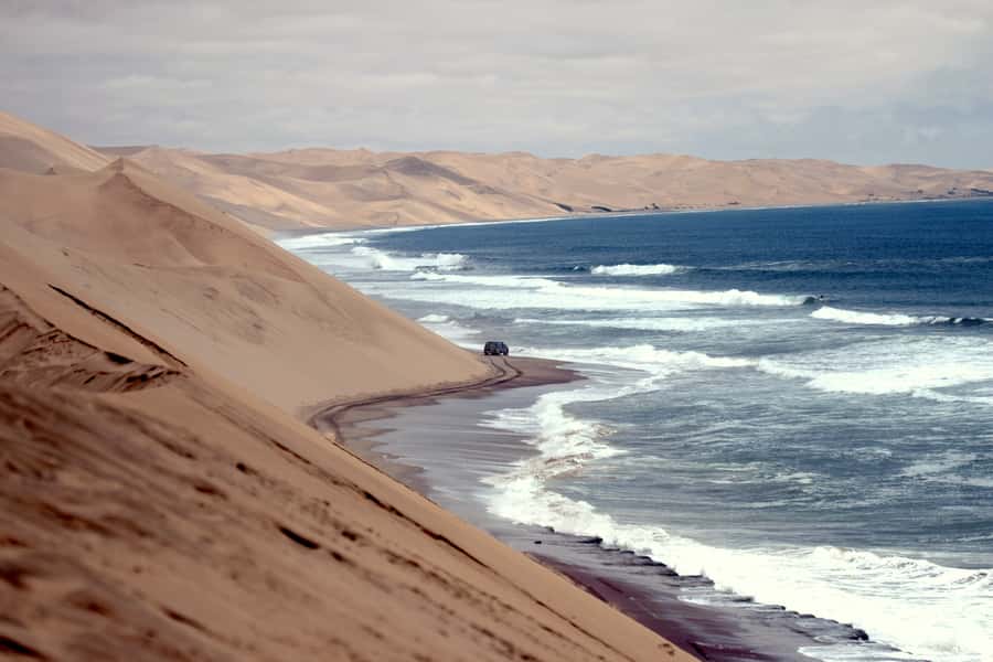 Walvis Bay: 4x4 Desert Excursion to Sandwich Harbour Bay - Sandwich Harbour by 4x4: beach driving depends on tides