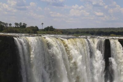 Zimbabwe & Zambia: Guided Tour of the Falls from Both Sides - The 6-hour flow: hotel pickup, van transfer, and how the timing feels